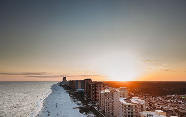 Beach shoreline at sunset