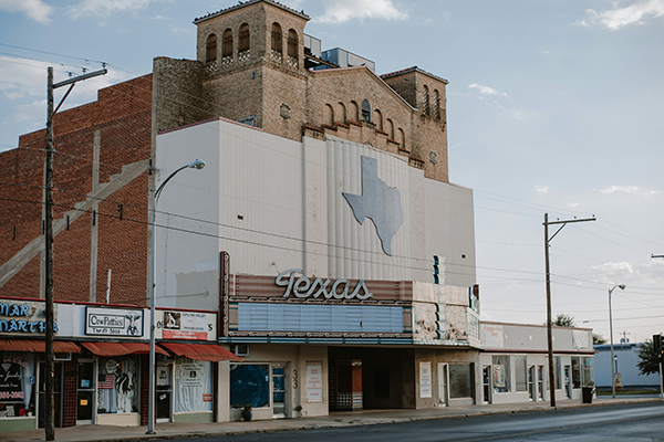 White and blue concrete building photo in texas